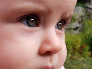 A close-up photograph of a child’s face.